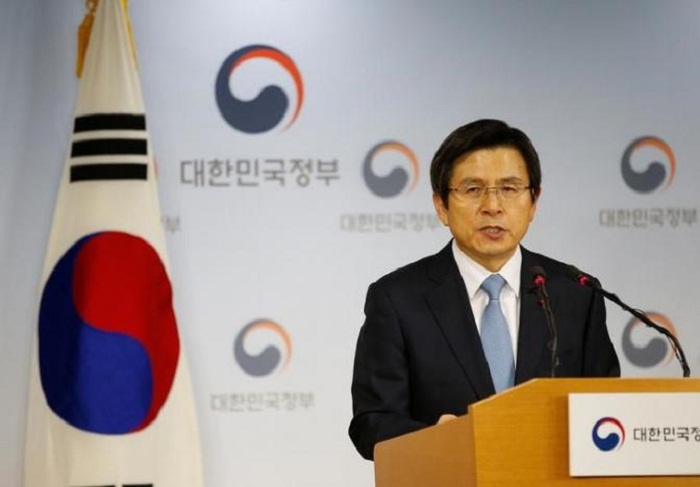 After impeachment, South Korea prime minister urges calm, vigilance 